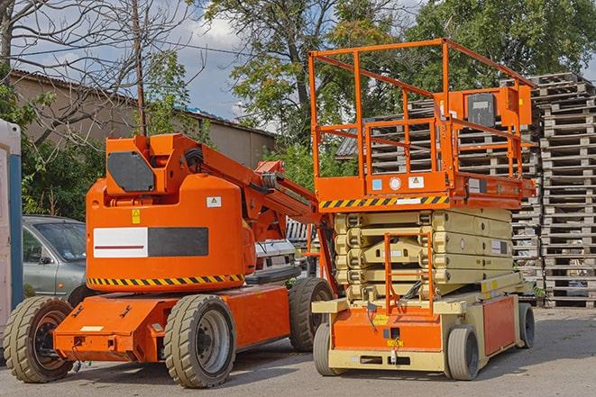 industrial forklift transporting goods in a warehouse setting in Center Line, MI